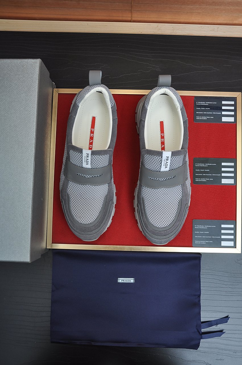 Prada Gray Strap Slip-On Sneakers
